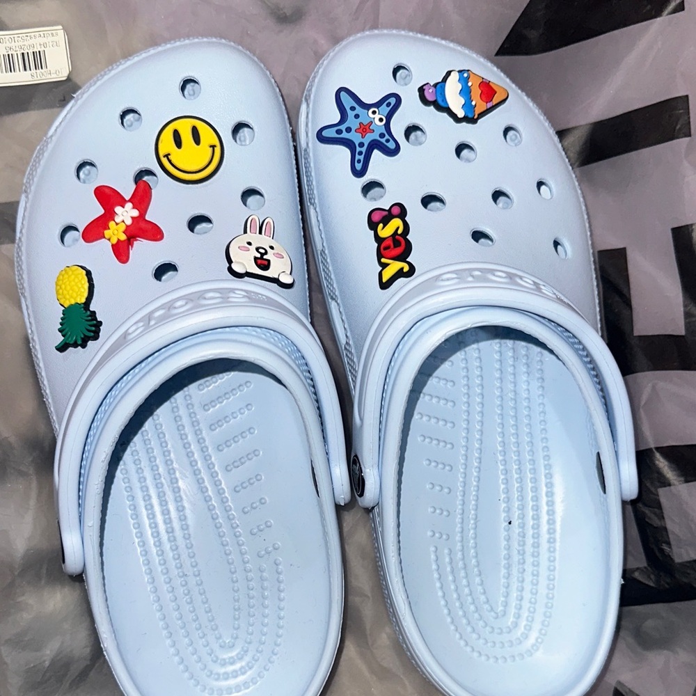 Light blue crocs - image 1